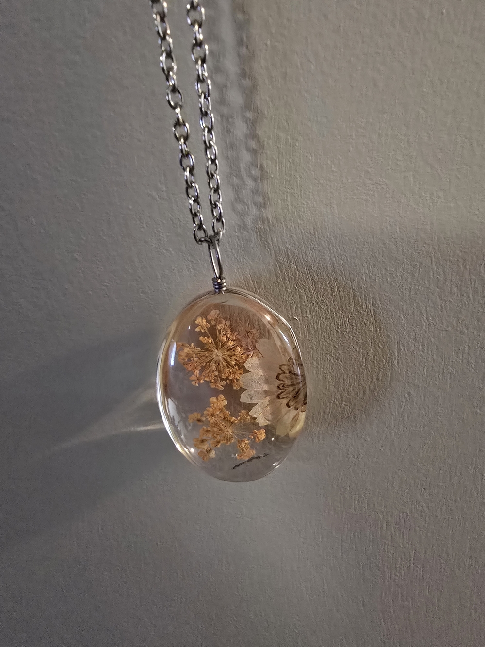 Plunder Clear Resin Necklace with Gold Floral Inlay